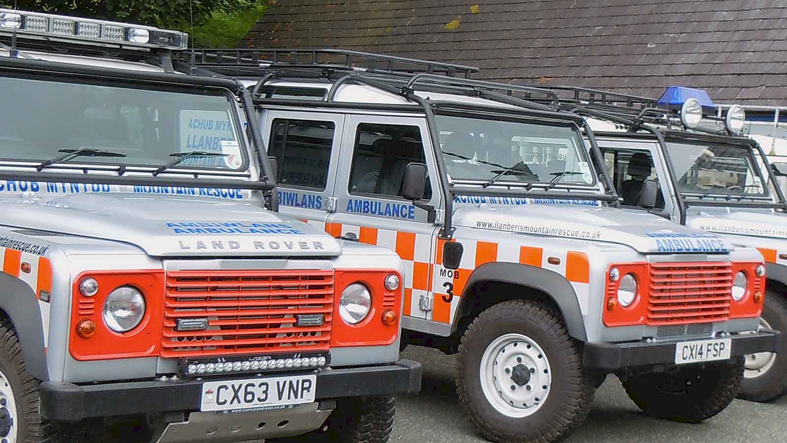 Image of the Llanberis Mountain Rescue Team Landrovers parked up outside of their base in Nant Peris.